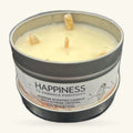 Cream soy wax candle in a tin with grey lid, three golden citrine crystals poking through the surface
