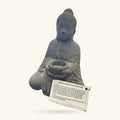 Grey stone Buddha statue, 25cm tall, seated in meditation pose with hands cupped holding offering bowl