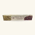 Green Tree California White Sage and Dragon's Blood Incense box with dried sage and red flowers