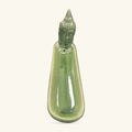 Tall green ceramic Buddha head incense holder with pointed ushnisha and draped robes