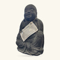 Stone laughing Buddha statue, 25cm tall, dark grey with weathered finish, seated pose with serene expression