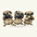 Three cream and black pug figurines in sitting poses, each with paw raised to face in different gestures