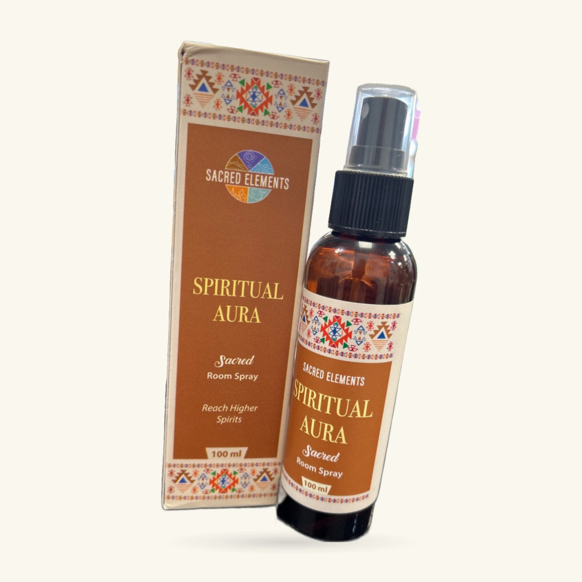 Sacred Elements Spiritual Aura room spray in amber glass bottle with black spray pump, next to printed cardboard box