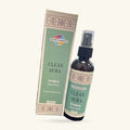 Sacred Elements Clean Aura room spray: green box and dark glass bottle with patterned trim band